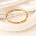 Cleo Segmented Gold Handcuff