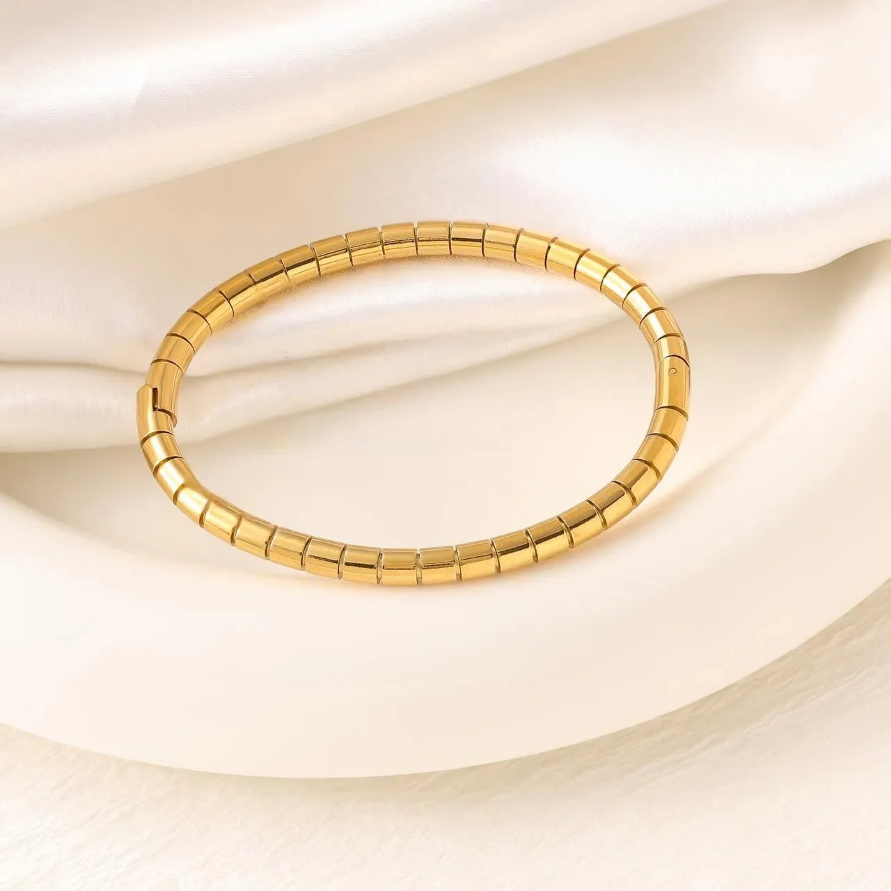 Cleo Segmented Gold Handcuff