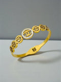 The Luxe Interlocking Motif Bangle