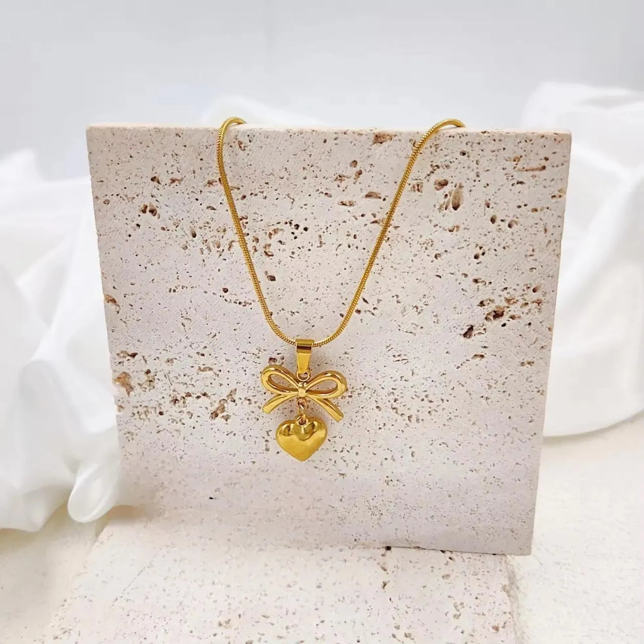 The Gold Ribbon Bow & Heart Pendant Necklace
